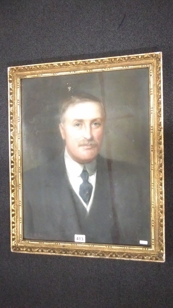 An early 20th Century pastel portrait of a professional gentleman.