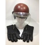 A vintage 1969 Everoak Racemaster motorcycle helmet and pair of Goldtop motorbike gloves.