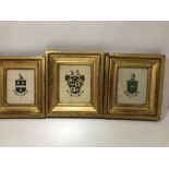 Three 19th Century frame and glazed hand painted coats of arms.