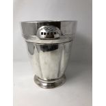 A silver plated twin handled ice bucket.