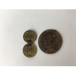 A 1908 Suffragette penny and a brooch from two 1 Double 1899 Guernesey coins impressed NUWSS.