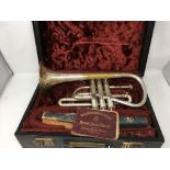 A Hawkes & Son "The Clippertone" Excelsor Sonorous Class A trumpet with three volumes etc.