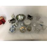 A box of assorted ceramics and glassware.