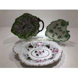 An 18th Century Worcester scale leaf dish painted with butterflies (repair to handle), an 18th