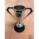 A twin handled sterling silver Waikee Hong Kong trophy with a plaque.