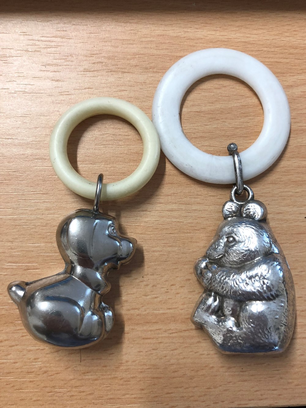 Two silver plated baby's teething rings.