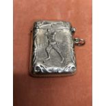 A silver vesta case decorated with a golfer.