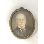 A 19th Century oval framed miniature on ivory depicting a gentleman.