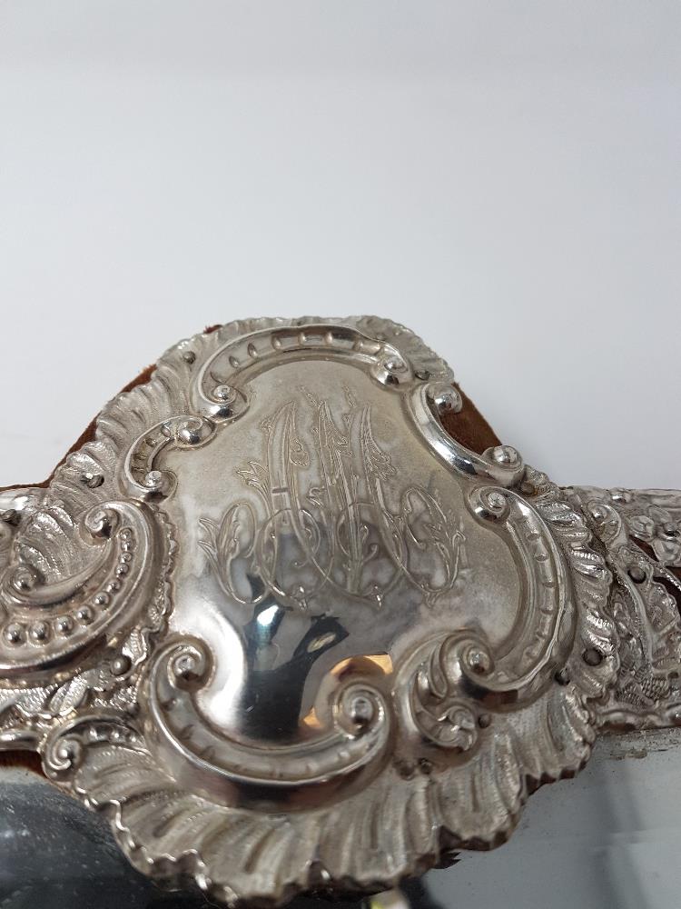 A large decorative 19th Century silver easel mirror with fine filigree decoration, on velvet. - Image 2 of 2