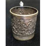 A silver plated cigarette box, a small white metal beaker and George IV stick pin.