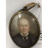 A 19th Century oval framed miniature on ivory depicting a gentleman.