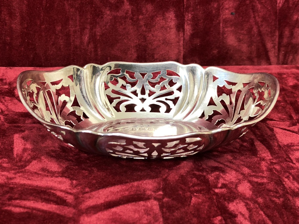 A pierced silver bonbon dish.