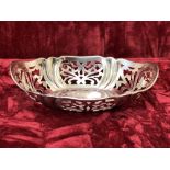 A pierced silver bonbon dish.