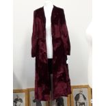 A 1930s crushed red velvet unlined fitted open dress coat.