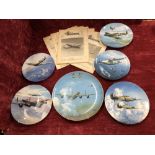 A miscellaneous collection of collectors plates and other items