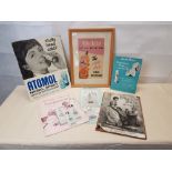 An assortment of shop advertising counter top cards.