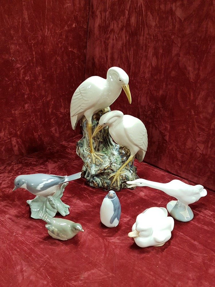 A collection of ceramics in the form of birds including Lladro and Royal Copenahgen.