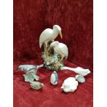 A collection of ceramics in the form of birds including Lladro and Royal Copenahgen.