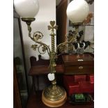 A large brass Art Nouveau/Irish style double lamp.