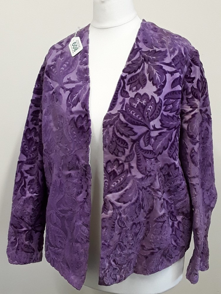 A late Victorian/early Edwardian, purple flocked velvet lady's jacket.