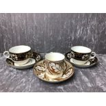 A pair of late 18th Century/early 19th Century cabinet cups, possibly Worcester, and saucer.