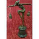 An Art Deco bronze on marble base of a dancing ballerina.