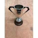 A twin handled sterling silver Waikee Hong Kong trophy with a plaque.