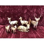 Six Beswick stags, does and fawns.