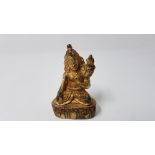 A Tibetan Buddhist gilded Tara Kwan-Yin Buddha deity.