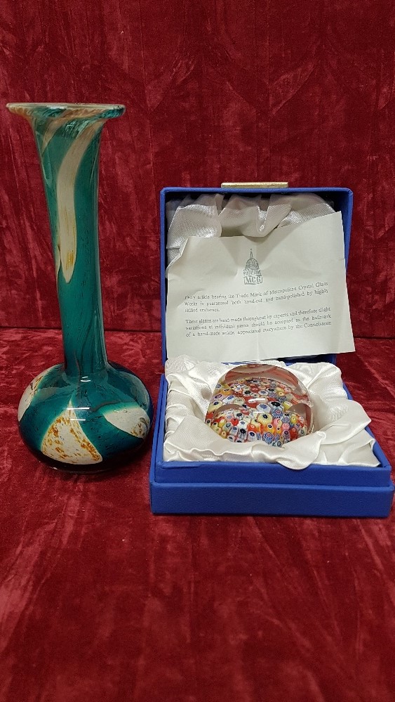 A boxed Strathearn Glass millefiori paperweight and a signed studio glass bud vase.