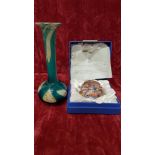 A boxed Strathearn Glass millefiori paperweight and a signed studio glass bud vase.