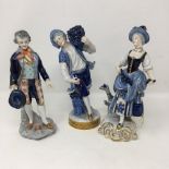 Two German porcelain figures and a Carl Thieme Saxony figure.