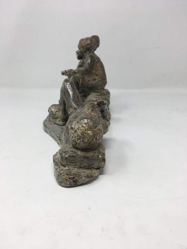 A fine African carved stone rustic sculpture of three assorted African figures in pose. - Image 4 of 5