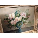 An oil on board depicting a still life of roses in a pedestal vase.