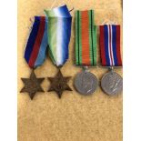 A WW2 Royal Navy officers medal group of four including the Atlantic Star