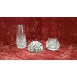 Three pieces of cut glass crystal.