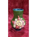 An attractive blue/green Moorcroft baluster vase.