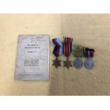 A WW2 Royal Army Service Corps medal group of four plus release book.