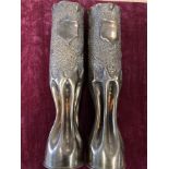 A matching pair of WW1 fluted trench art brass shell case vases.