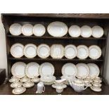 A Spode six setting gold/white Fleur de Lys pattern dinner/tea/coffee service including, 56 pieces.