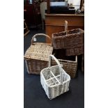 A collection of four woven/ wicker baskets.