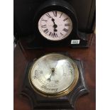 A Laura Ashley ‘Newgate' mantel clock and wall mounted barometer.