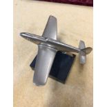 A plated model of a WW2 Mustang on a marble base. Wingspan 15cms