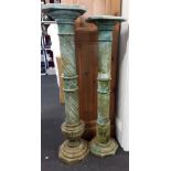 A pair of faux marble painted jardiniere stands.