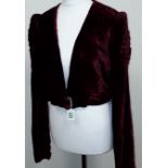 A late Victorian short jacket in burgundy.