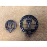 A Robertson Clan Glengarry cap badge and smaller silver brooch.