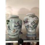 Two bulbous shaped Chinese vases.