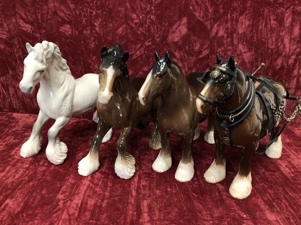 Four Beswick shire horses.