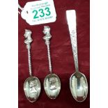 Three silver spoons - two depicting Queen Victoria and one depicting Queen Elizabeth II.
