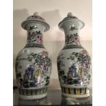 A near pair of early 20th Century Chinese baluster shaped vases.